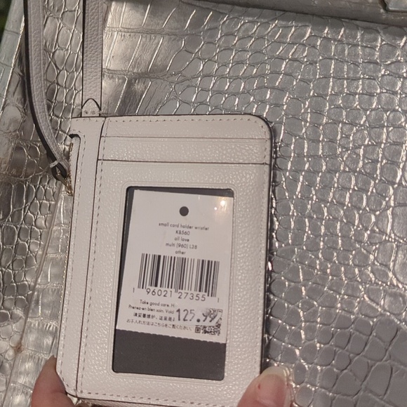 Kate Spade small cardholder wristlet  with extendable strap
